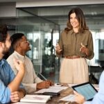 Happy,Middle,Aged,Business,Woman,Executive,Ceo,Leader,Discussing,Project