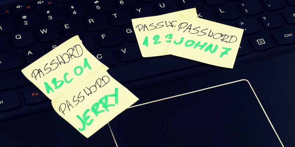 Passwords on Post-its in violation of compliance.